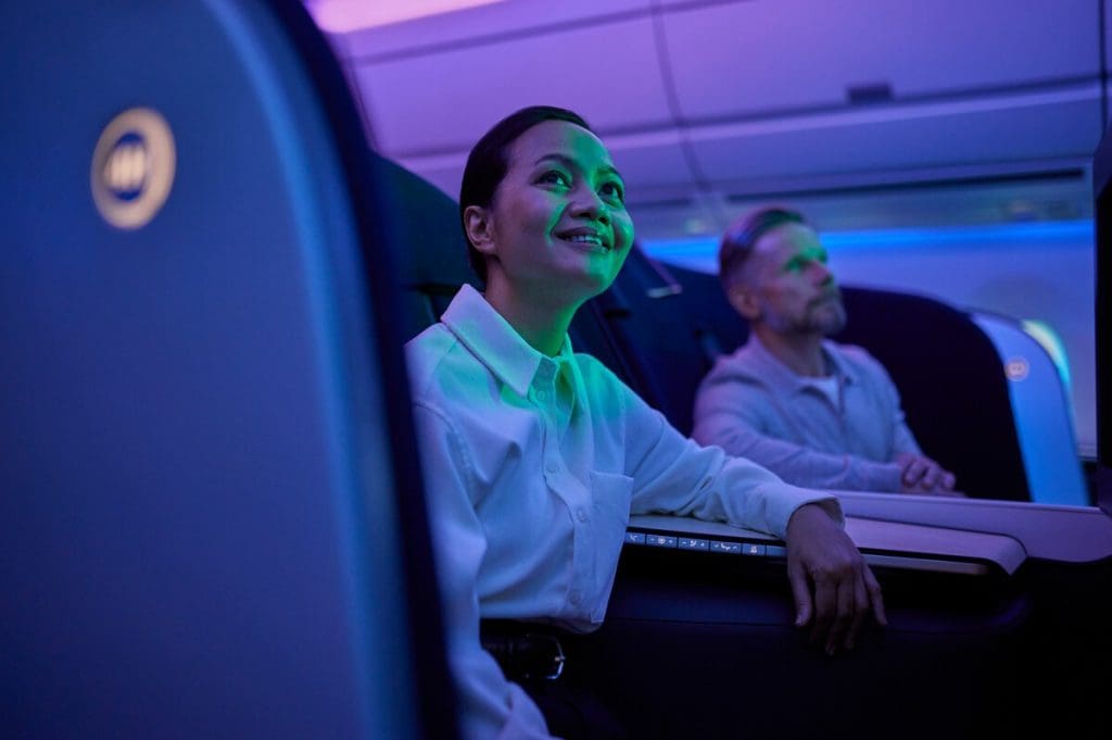Northern Ireland Travel Magazine Finnair_A350_business_class_woman_smiling_nordic_lights_0500retv2-1024x681 Finnair’s AirLounge seat named ‘Best New Business Class in 2022’  
