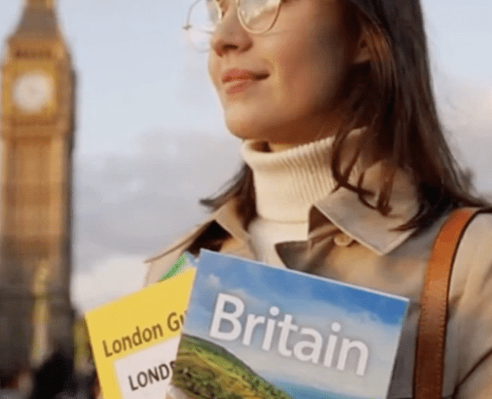 picture of lady with travel gides